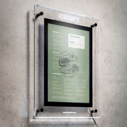 Illuminated outdoor menu display case wall mounted at restaurant entrance, backlit LED panel, portrait orientation